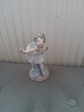 Nao By Lladro Ballerina With Flower Porcelain Figurine