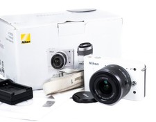 Nikon 1 J1 Mirrorless Camera &
