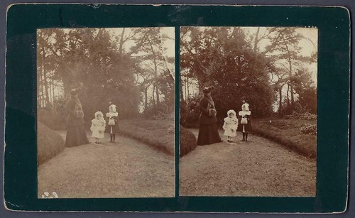 Mother with two daughters - , in