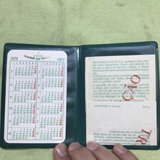 Vintage Rolex wallet/paper holder;translation;1976-77 calendar 50th Anniversary