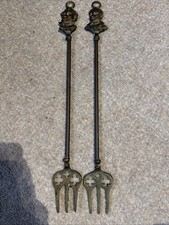 Pair Of Antique brass Toasting
