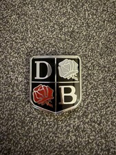 DAVID BROWN TRACTOR ROSES BADGE - EARLY TYPE
