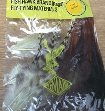 +Collection of fly tying feathers and hackles. 13 packs