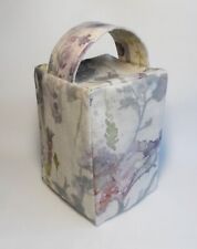 Handmade self-fill doorstop. Linen look cotton fabric with a floral print.