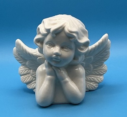 White ceramic cherub figurine - white,