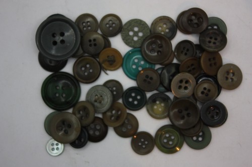 Green buttons hole plastic - hole,