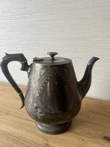 Antique teapot with - , intricate