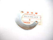 Retaining arm spring main