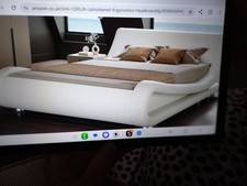 cream leather sleigh bed.