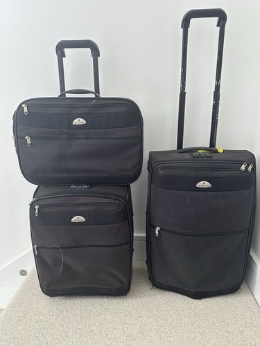 Three samsonite travel - three,
