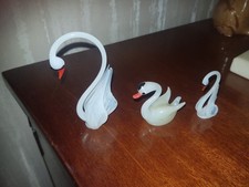 3 glass swans