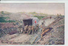 WW1 - HELPING AN AMBULANCE THROUGH THE MUD COLOUR  POSTCARD +