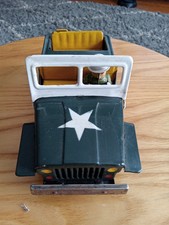Old tin army jeep with - army,