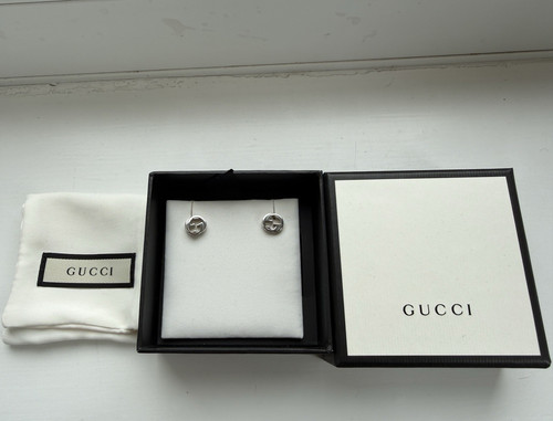 Gucci signed logo round - gg,