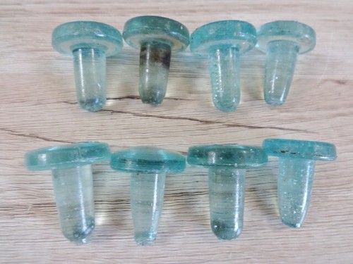Antique glass bottle stoppers - glass,