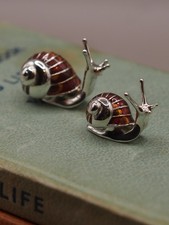 TWO SATURNO STERLING SILVER &