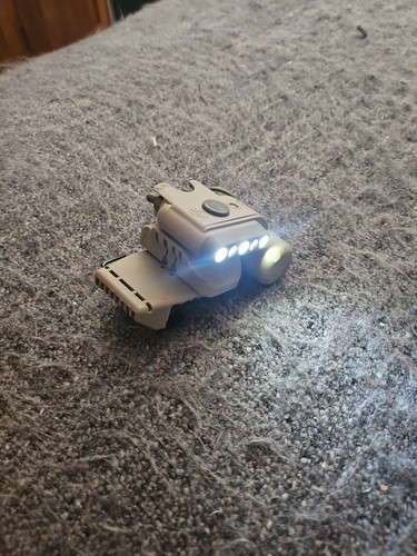Sure fire helmet light - sure,