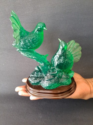 Green jade color statue - color, birds