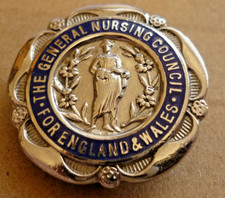 VINTAGE ENAMEL BADGE GENERAL