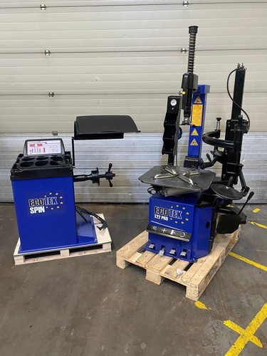 Slightly damaged tyre changer - tyre,