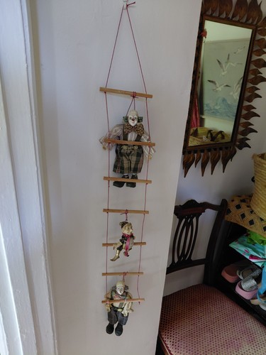 Vintage clown puppets hanging - puppets,