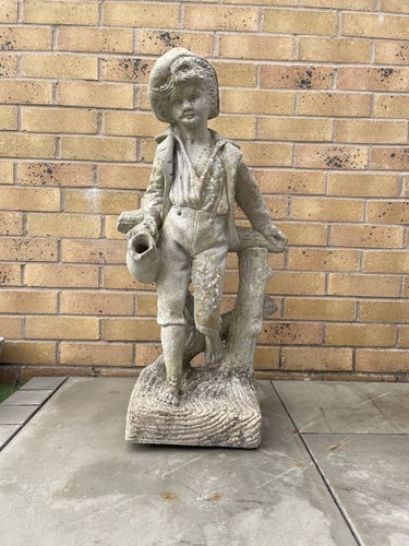 Stone statue boy pouring - stone,