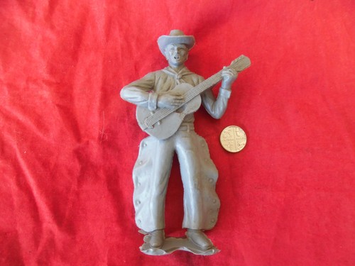 Singing grey cowboy - , plastic