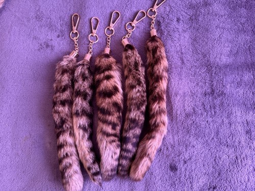 Random spotted skunk tail - spotted,