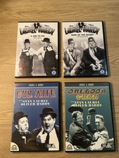 A Collection Of Laurel and Hardy DVDs.