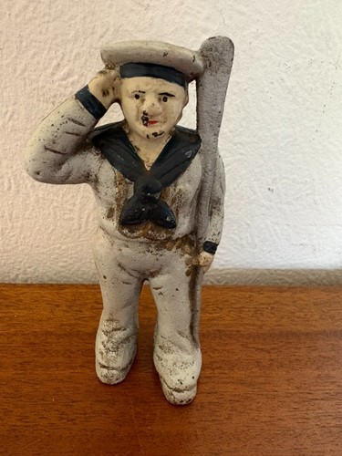 Antique cast iron sailor - cast,