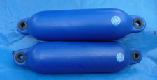 A pair of boat fenders by
