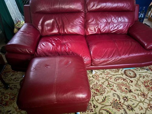 Leather sofa and footstool