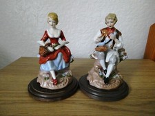 Vintage pair of figurines in
