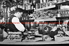 F020263 Bar counter with sandwiches in the interior of a famous Parisian bar Par