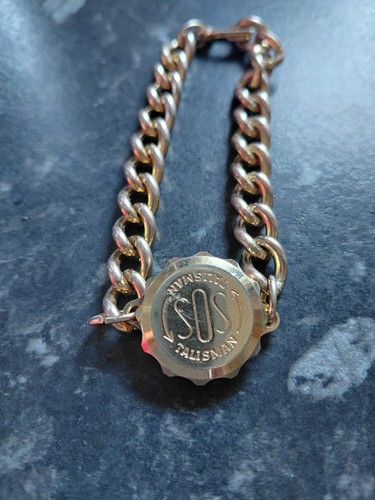 This gold tone curb link - this,