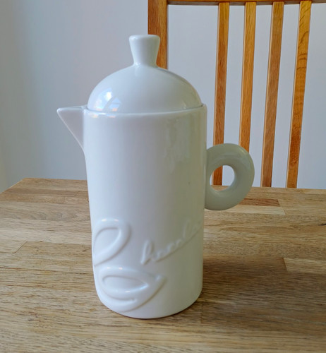 White ceramicjug with - with, lid