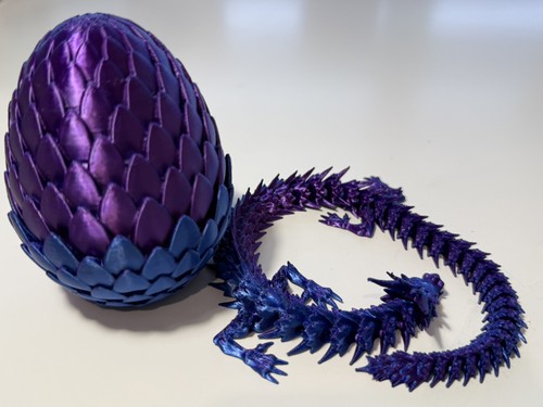 Articulated dragon with egg - with,