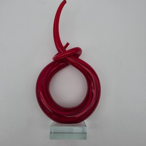 Red glass sculpture - red, knot