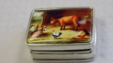  SILVER AND ENAMEL PILL BOX WITH A STABLE SCENE ON LID