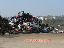 PHOTO  SCRAP VEHICLES BESIDE PILES OF RUSTING METAL IN A COMPOUND AT BARRY DOCKS
