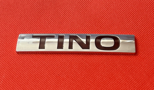 Nissan tino vintage car badge - tino,