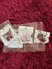 Three Pairs Of Tiny Dolls