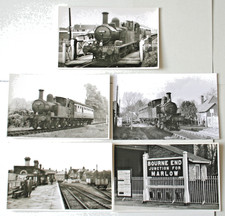 5 photo prints at / near