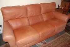 Three Seater Sofa, Armchair and Footstall in Buff Colour Leather