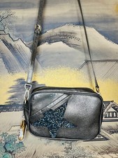 Golden Goose Star Bag in gray metallic leather & Swarovski crystal star.