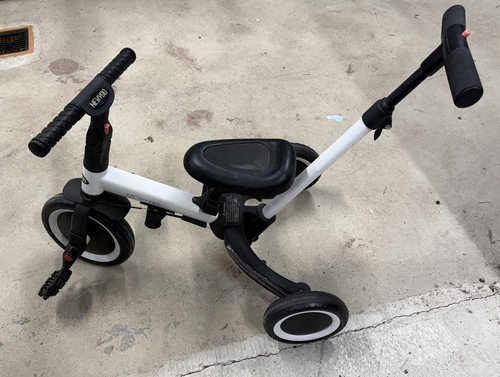 Newyoo trike with parent - with,