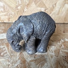 The Herd Elephant Figurine -