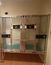 Double Cage w Divider, Front facing food bowls, Doors, slide out trays, castors