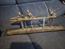 Resin and aluminum sculpture depicting three ballerinas 58 x 20 cm