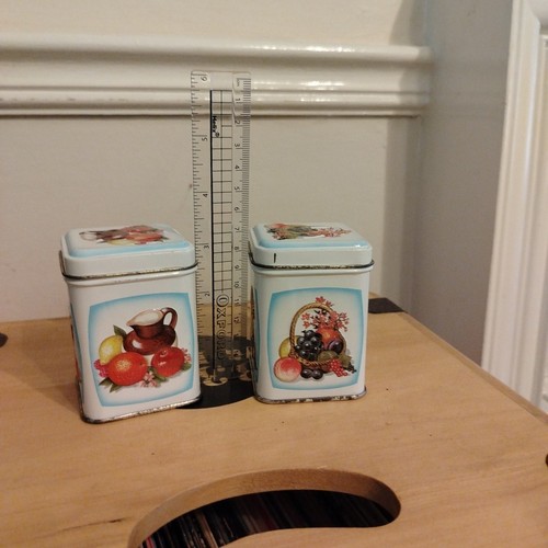 Two small decorative tea - two, tins